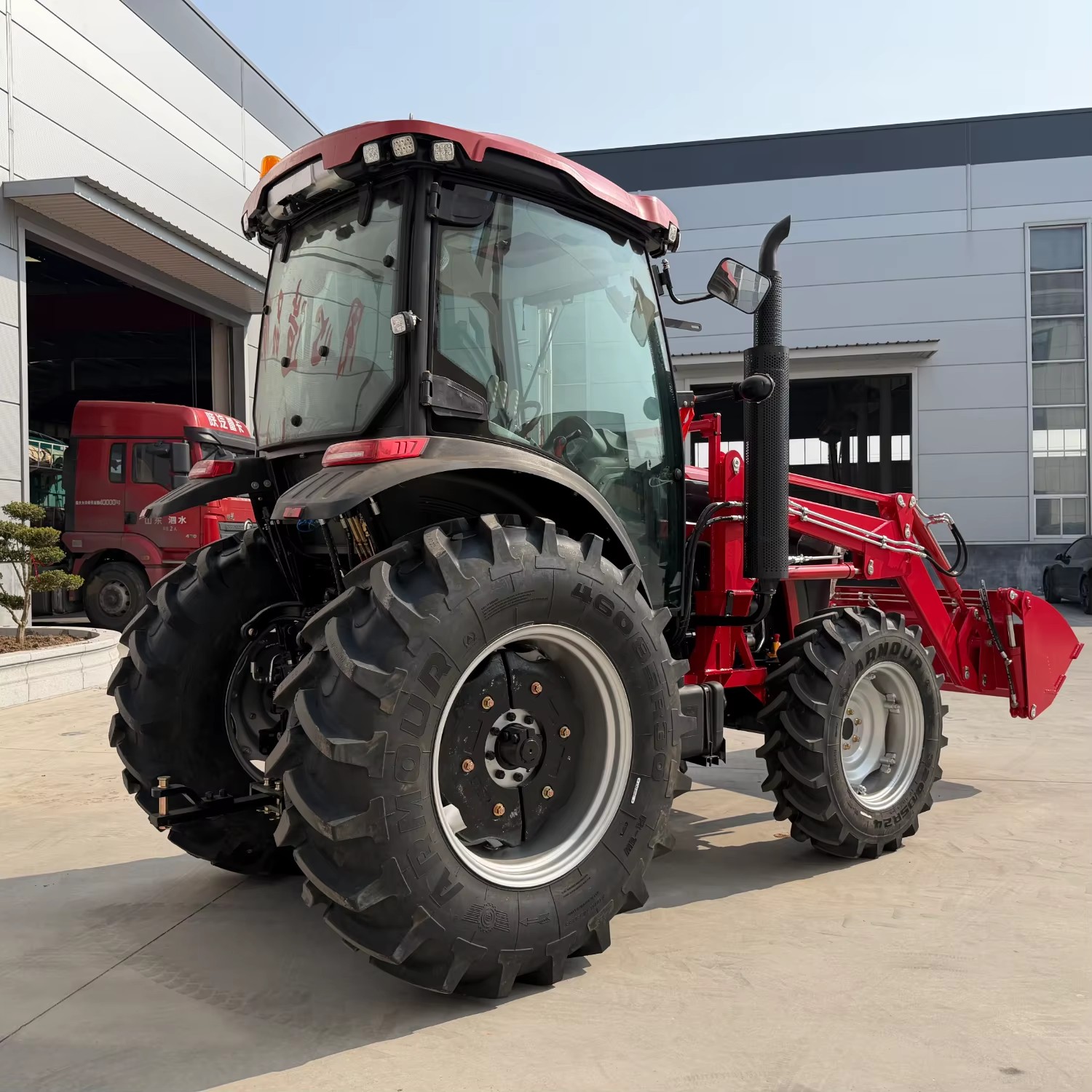 4WD Agricultural Wheel Tractor Front End Loader Enclosed Air Cabin Multi-functional Farm Tractor 100HP for Engine Match